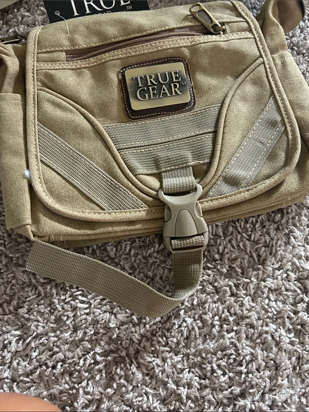Tan/khaki  Messenger crossbody Bag with Adjustable Strap. Waterproof liner